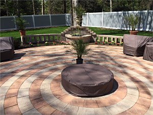 round alternating color cambridge patio canyon blend sandstone ledgestone circle kit with waterfall and seat wall